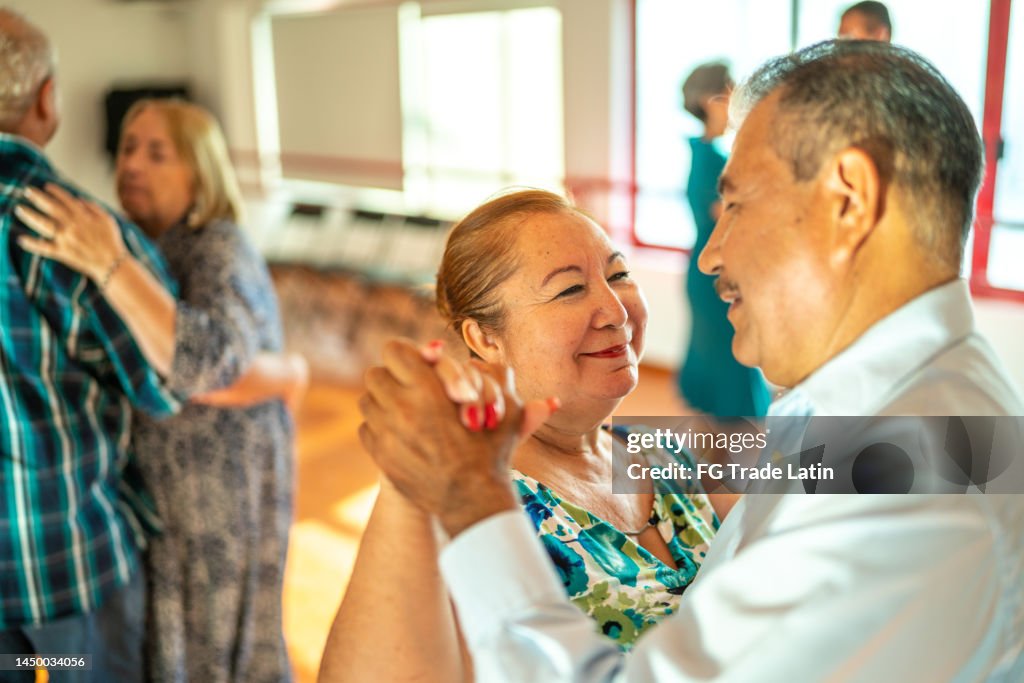 Senior couple dancing at dance studio