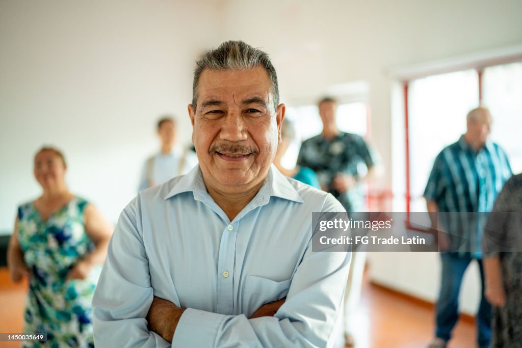 Portrait of mature man at dance studio