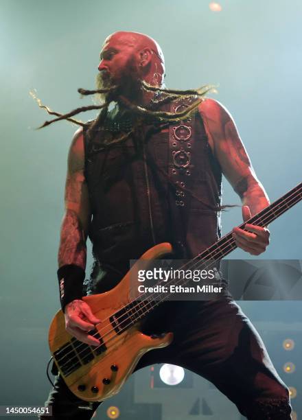 Bassist Chris Kael of Five Finger Death Punch performs at Michelob ULTRA Arena on December 17, 2022 in Las Vegas, Nevada.