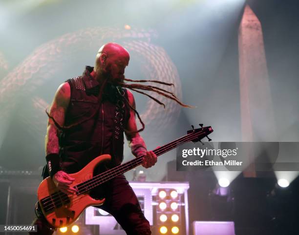 Bassist Chris Kael of Five Finger Death Punch performs at Michelob ULTRA Arena on December 17, 2022 in Las Vegas, Nevada.