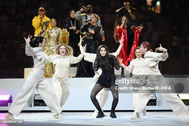 Davido, Aisha, Ozuna, Gims, Nora Fathi, Balqees, Rahma Riad and Manal perform during the closing ceremony prior to the FIFA World Cup Qatar 2022...