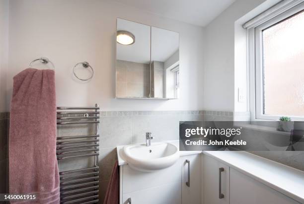 property bathroom interiors - domestic bathroom stock pictures, royalty-free photos & images