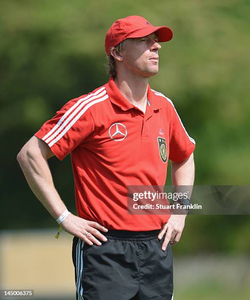 Steffen Freund, head coach of Germany U16's team ponders during the under 16's international friendly match between Germany and Denmark at the...