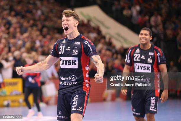 Emil Jakobsen of Flensburg celebrates after winning the LIQUI MOLY HBL match between SG Flensburg-Handewitt and THW Kiel at Flensarena on December...