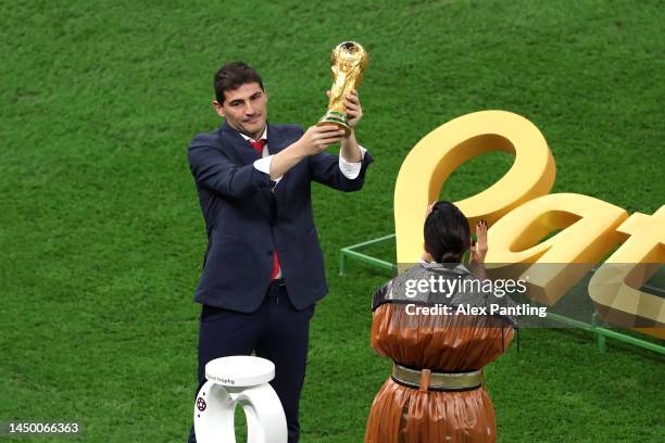 Iker Casillas presents the FIFA World Cup trophy prior to the FIFA World Cup Qatar 2022 Final match between Argentina and France at Lusail Stadium on...