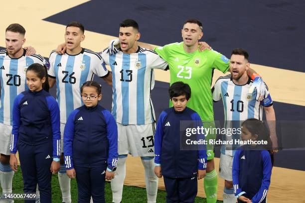 Lionel Messi of Argentina lines up for the national anthem with teammates prior to the FIFA World Cup Qatar 2022 Final match between Argentina and...