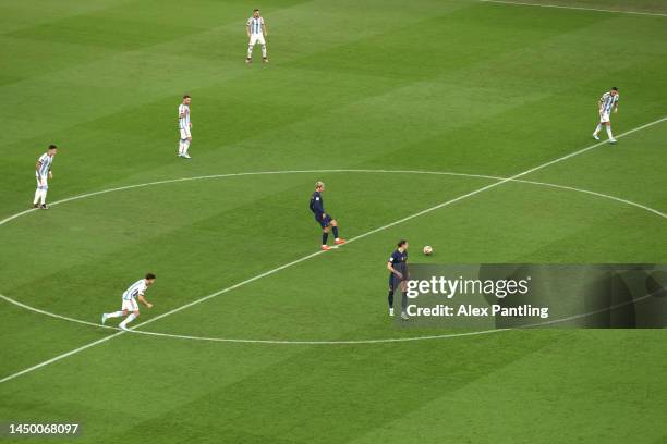 Antoine Griezmann of France kicks off during the FIFA World Cup Qatar 2022 Final match between Argentina and France at Lusail Stadium on December 18,...