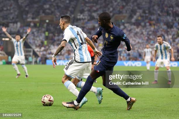 Angel Di Maria of Argentina is fouled by Ousmane Dembele of France which leads to a penalty to Argentina during the FIFA World Cup Qatar 2022 Final...