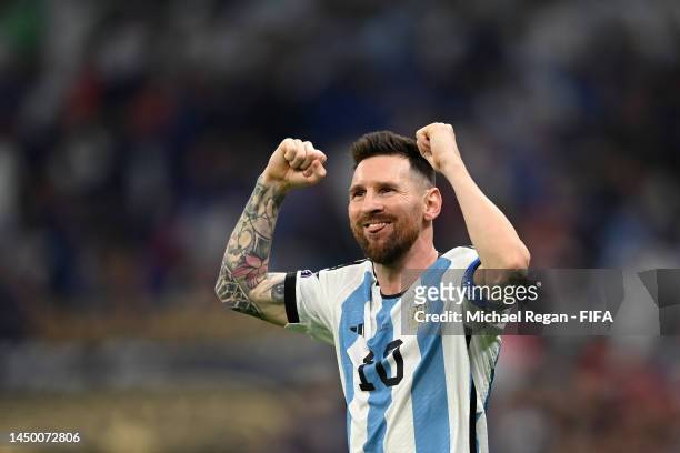 Lionel Messi of Argentina celebrates after scoring the team's first goal during the FIFA World Cup Qatar 2022 Final match between Argentina and...
