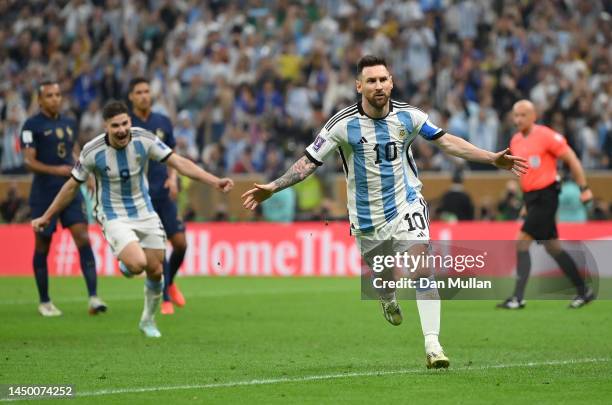 Lionel Messi of Argentina celebrates after scoring the team's first goal during the FIFA World Cup Qatar 2022 Final match between Argentina and...