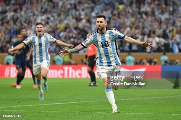 Lionel Messi of Argentina celebrates after scoring the team's first goal via a penalty during the FIFA World Cup Qatar 2022 Final match between...