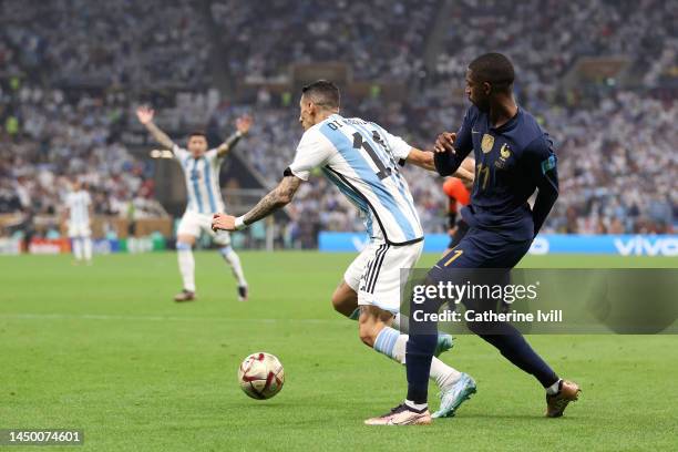 Angel Di Maria of Argentina is fouled by Ousmane Dembele of France which leads to a penalty to Argentina during the FIFA World Cup Qatar 2022 Final...