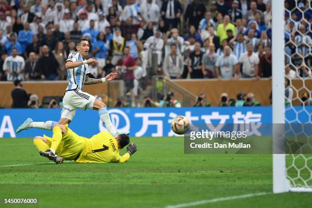 Angel Di Maria of Argentina scores the team's second goal past Hugo Lloris of France during the FIFA World Cup Qatar 2022 Final match between...