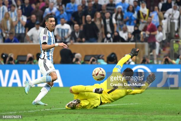 Angel Di Maria of Argentina scores the team's second goal past Hugo Lloris of France during the FIFA World Cup Qatar 2022 Final match between...