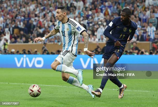 Angel Di Maria of Argentina is fouled by Ousmane Dembele of France which leads to a penalty to Argentina during the FIFA World Cup Qatar 2022 Final...