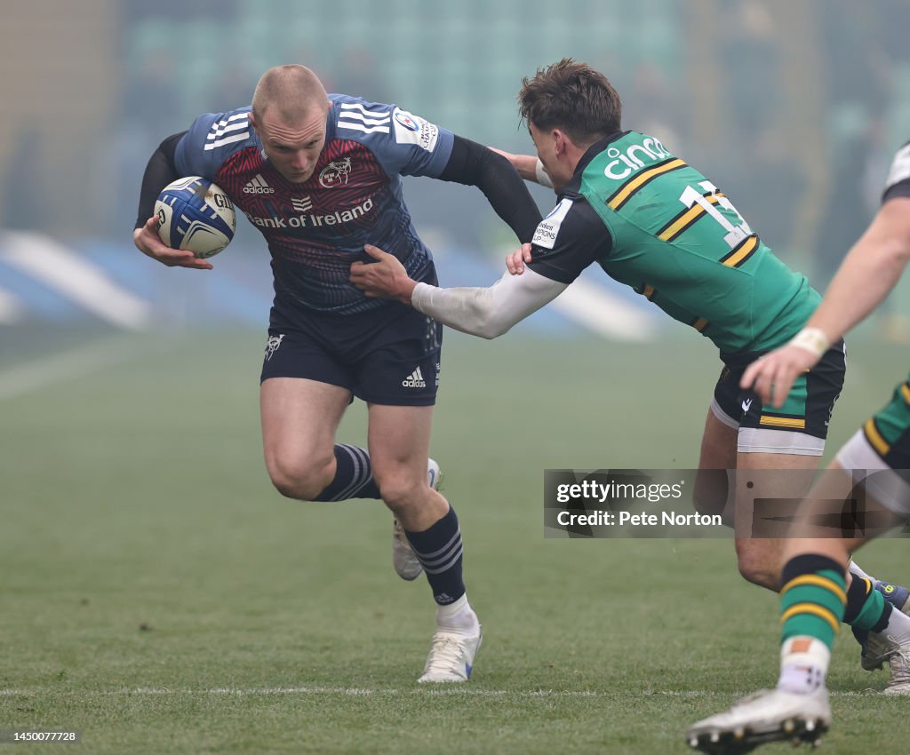 Keith Rix Rugby Keith Earls of Munster Rugby attempt to move forward with the ball as ...