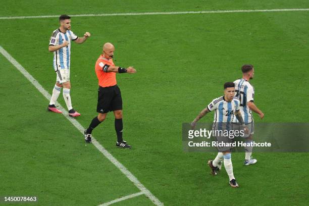 Referee Szymon Marciniak points the penalty spot after Angel Di Maria of Argentina is fouled in the box by fra11during the FIFA World Cup Qatar 2022...