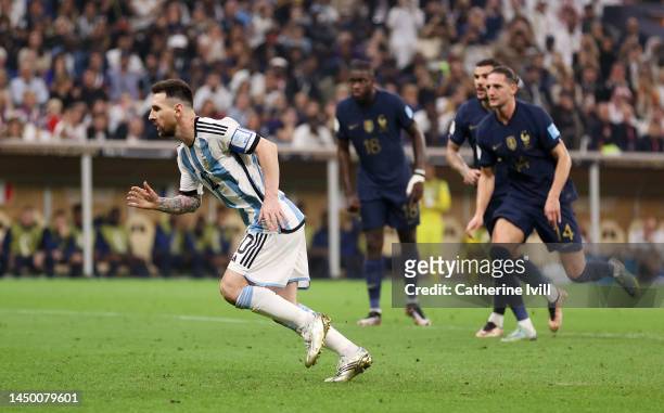 Lionel Messi of Argentina celebrates after scoring the team's first goal during the FIFA World Cup Qatar 2022 Final match between Argentina and...