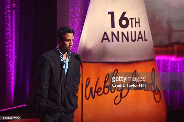 Lin-Manuel Miranda presents an award at the 16th Annual Webby Awards at Hammerstein Ballroom on May 21, 2012 in New York City.
