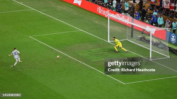 Lionel Messi of Argentina scores the team's first goal via a penalty past Hugo Lloris of France during the FIFA World Cup Qatar 2022 Final match...
