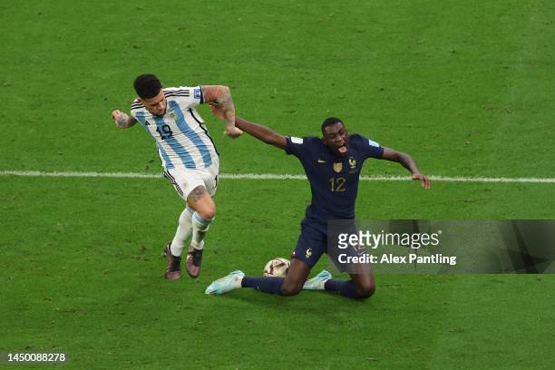 Nicolas Otamendi of Argentina fouls Randal Kolo Muani of France which leads to a penalty for France during the FIFA World Cup Qatar 2022 Final match...