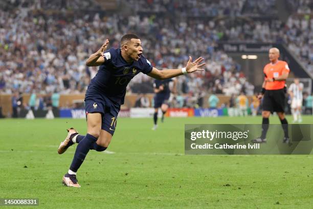 Kylian Mbappe of France celebrates after scoring the team's second goal during the FIFA World Cup Qatar 2022 Final match between Argentina and France...