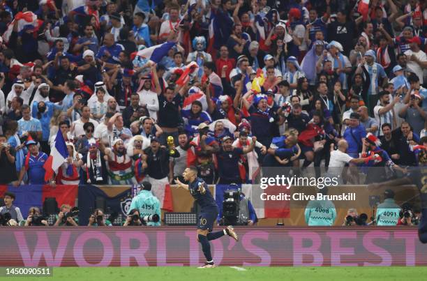 Kylian Mbappe of France celebrates after scoring the team's second goal during the FIFA World Cup Qatar 2022 Final match between Argentina and France...