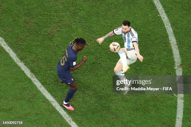 Lionel Messi of Argentina battles for possession with Eduardo Camavinga of France during the FIFA World Cup Qatar 2022 Final match between Argentina...