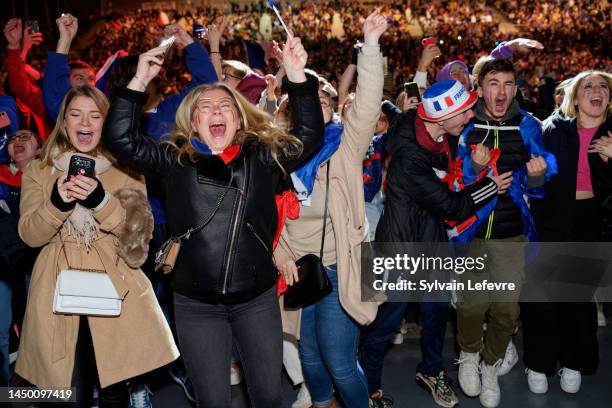 Supporters of France react as they watch the giant screen live broadcast of Argentina v France FIFA World Cup Qatar 2022 Finals Match on December 18,...