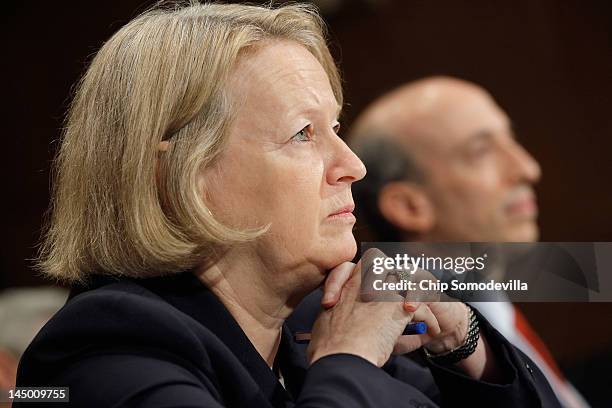 Securities and Exchange Commission Chairman Mary Schapiro and Futures Trading Commission Chairman Gary Gensler testify before the Senate Banking,...