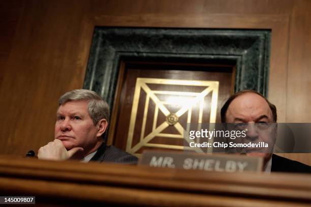 Senate Banking, Housing and Urban Affairs Committee Chairman Tim Johnson and ranking member Sen. Richard Shelby listen to opening remarks from...