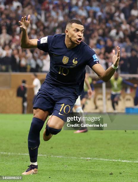 Kylian Mbappe of France celebrates after scoring the team's third goal and their hat trick from the penalty spot during the FIFA World Cup Qatar 2022...