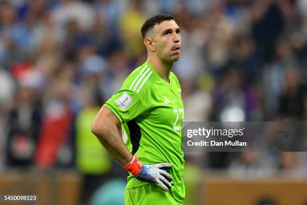 Emiliano Martinez of Argentina reacts after France's third goal during the FIFA World Cup Qatar 2022 Final match between Argentina and France at...