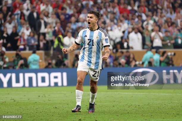 Paulo Dybala of Argentina celebrates scoring the team's second penalty in the penalty shoot out during the FIFA World Cup Qatar 2022 Final match...