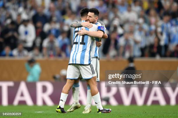 Paulo Dybala of Argentina celebrates with Lionel Messi scoring the team's second penalty in the penalty shoot out during the FIFA World Cup Qatar...