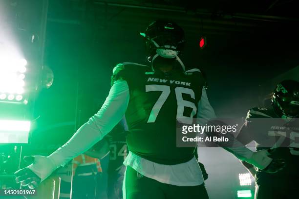 George Fant of the New York Jets takes to the field before a game against the Detroit Lions at MetLife Stadium on December 18, 2022 in East...