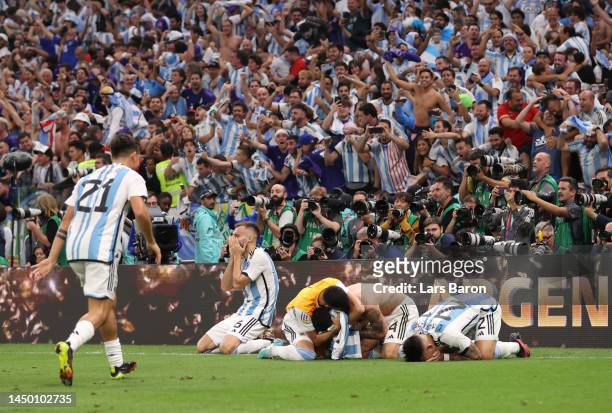 Argentina players celebrate the fourth and winning penalty by Gonzalo Montiel in the penalty shootout during the FIFA World Cup Qatar 2022 Final...