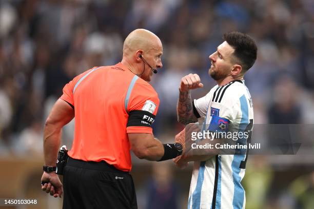 Referee Szymon Marciniak speaks to Lionel Messi of Argentina during the FIFA World Cup Qatar 2022 Final match between Argentina and France at Lusail...