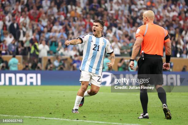 Paulo Dybala of Argentina celebrates scoring the team's second penalty in the penalty shoot out during the FIFA World Cup Qatar 2022 Final match...