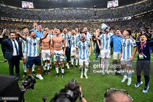 Players of Argentina celebrates in front of their fans after defeating France in the penalty shootout to win the World Cup Final during the FIFA...