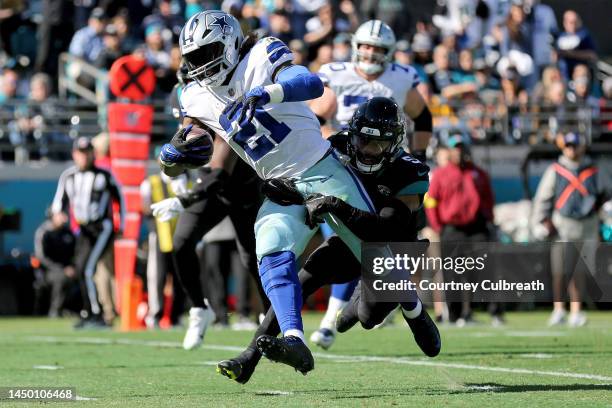 Ezekiel Elliott of the Dallas Cowboys rushes for a touchdown during the first quarter of the game against the Jacksonville Jaguars at TIAA Bank Field...