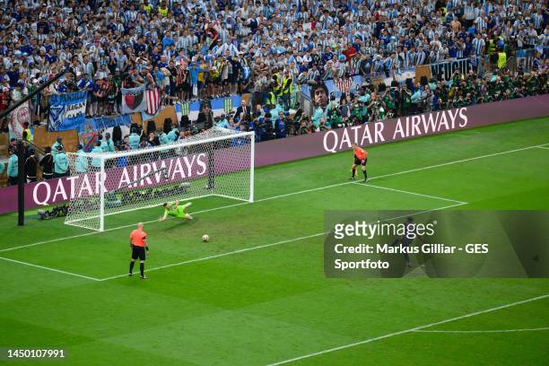 Aurelien Tchouameni of France misses his penalty against Damian Martinez of Argentinia during the FIFA World Cup Qatar 2022 Final match between...