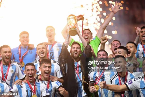 Lionel Messi of Argentina lifts the FIFA World Cup Qatar 2022 Winner's Trophy during the FIFA World Cup Qatar 2022 Final match between Argentina and...