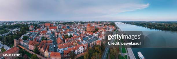 aerial view of torun cityscape during sunset in poland - cieszyn stock pictures, royalty-free photos & images