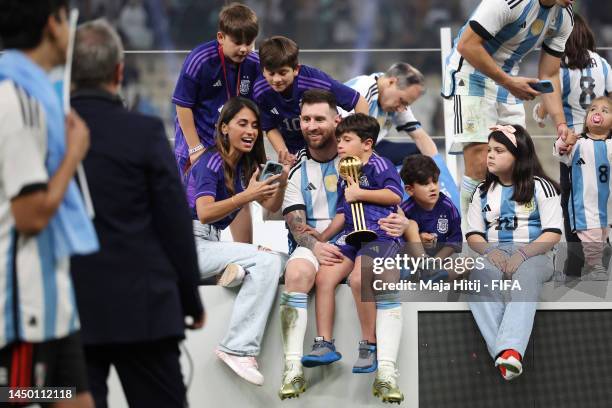 Lionel Messi of Argentina celebrates with his wife Antonela Roccuzzo and their children and family members following the FIFA World Cup Qatar 2022...