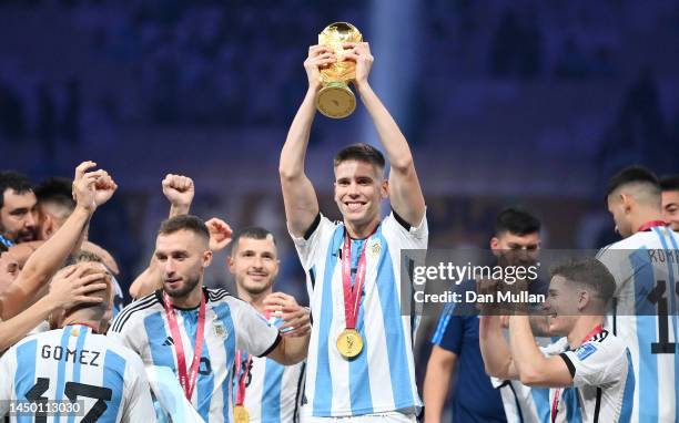 Juan Foyth of Argentina lifts the FIFA World Cup Qatar 2022 Winner's Trophy after the FIFA World Cup Qatar 2022 Final match between Argentina and...