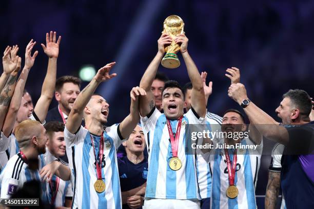 Marcos Acuna of Argentina lifts the FIFA World Cup Qatar 2022 Winner's Trophy after the FIFA World Cup Qatar 2022 Final match between Argentina and...