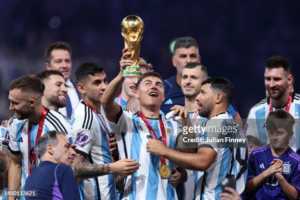 Paulo Dybala of Argentina lifts the FIFA World Cup Qatar 2022 Winner's Trophy after the FIFA World Cup Qatar 2022 Final match between Argentina and...