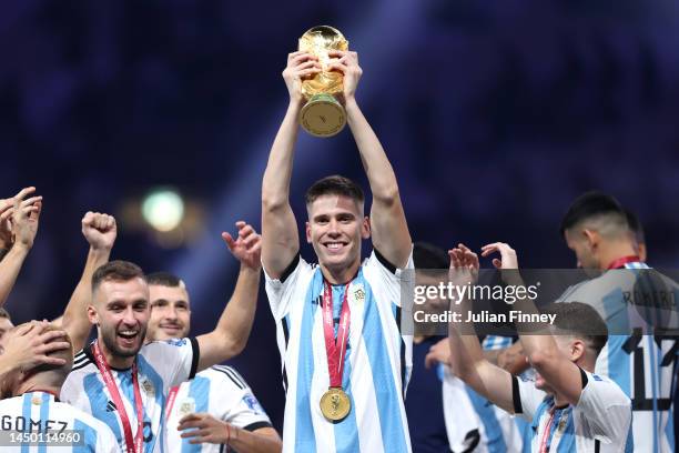 Juan Foyth of Argentina lifts the FIFA World Cup Qatar 2022 Winner's Trophy during the FIFA World Cup Qatar 2022 Final match between Argentina and...