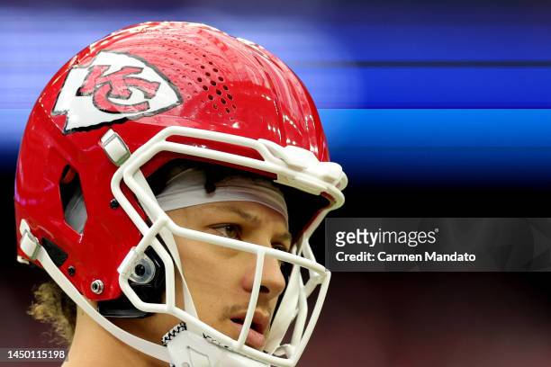 Patrick Mahomes of the Kansas City Chiefs looks on during the first half of the game against the Houston Texans at NRG Stadium on December 18, 2022...